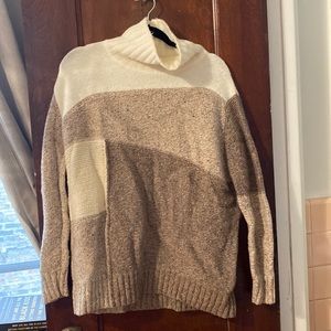 Knit patchwork sweater. Turtleneck.
